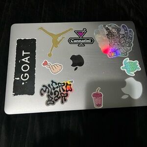 Silver MacBook Laptop with Assorted Stickers - Silver
